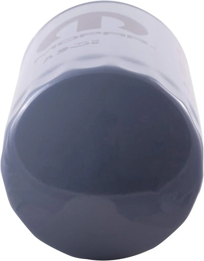 Dark blue cylindrical container with a clear lid on a white background